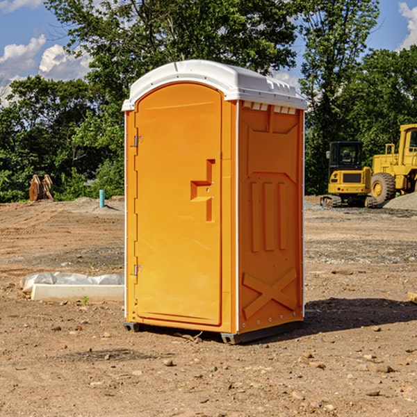 how often are the portable restrooms cleaned and serviced during a rental period in Yogaville Virginia